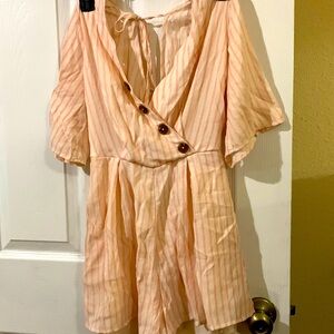 Pretty romper  Charlotte Russe size small does have elastic waist in the back